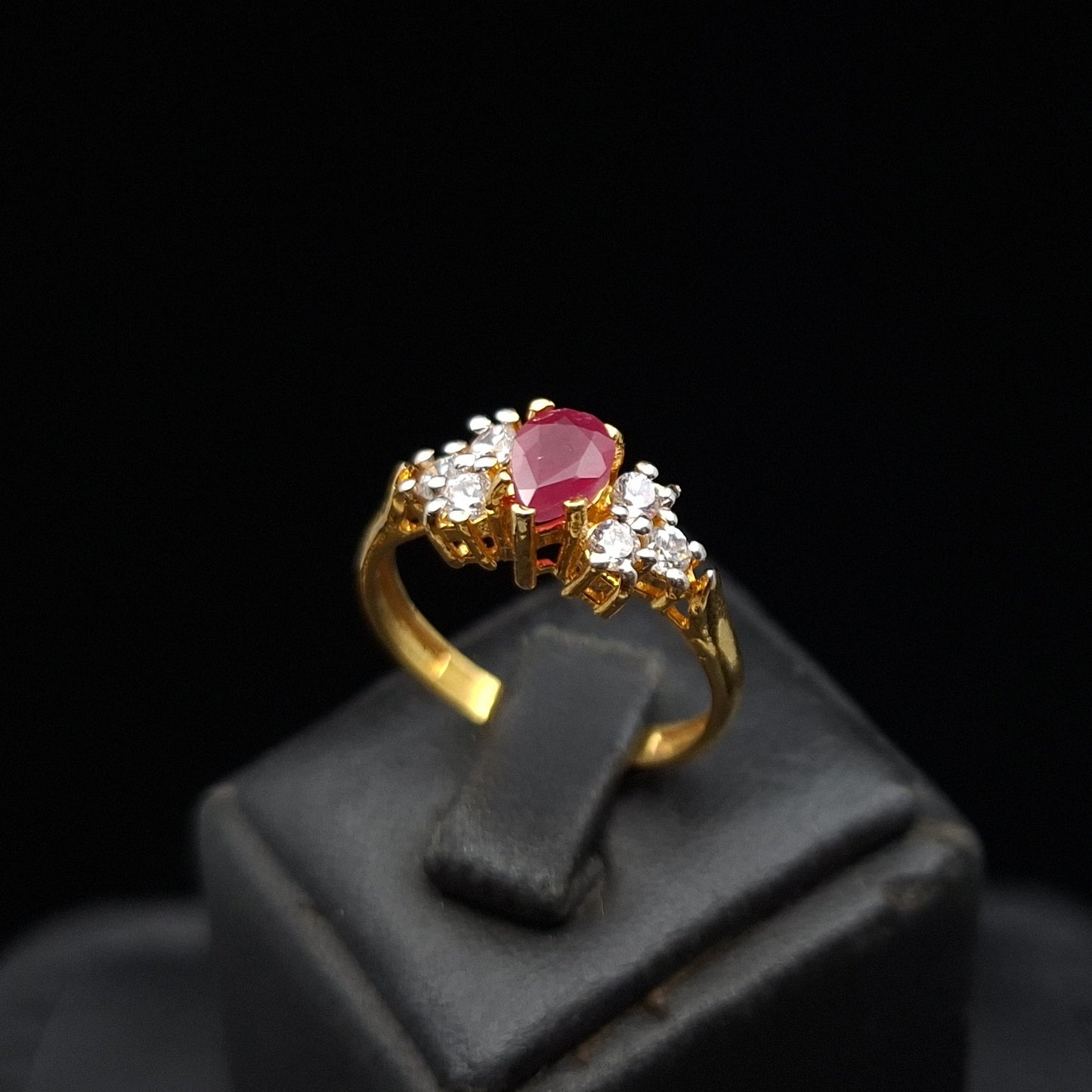 Ruby with Zirconia Side Stones on Gold-plated Sterling Silver Ring